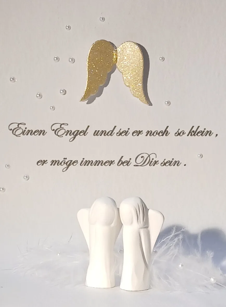 Kleiner weißer Schutzengel als stilles Zeichen der Verbundenheit